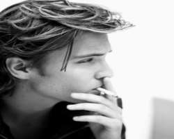 Luke Grimes smoking